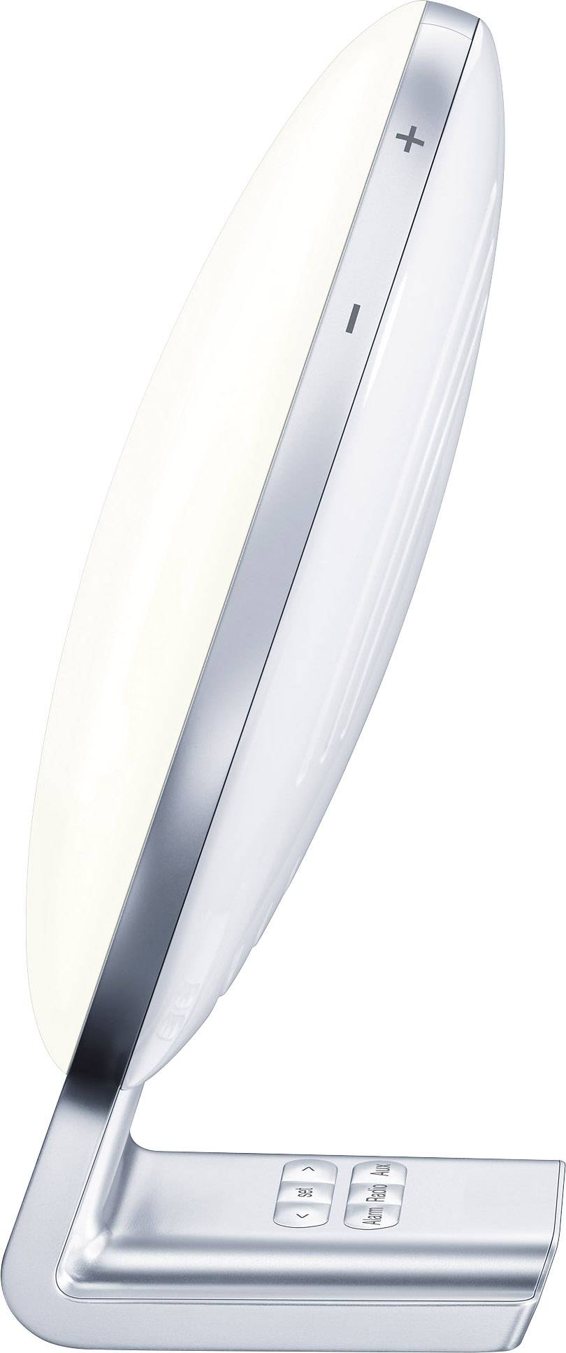 Štíhlá, oválná lampa se stříbrným lemováním a tlačítky na základně. Ideální pro moderní interiérové osvětlení.