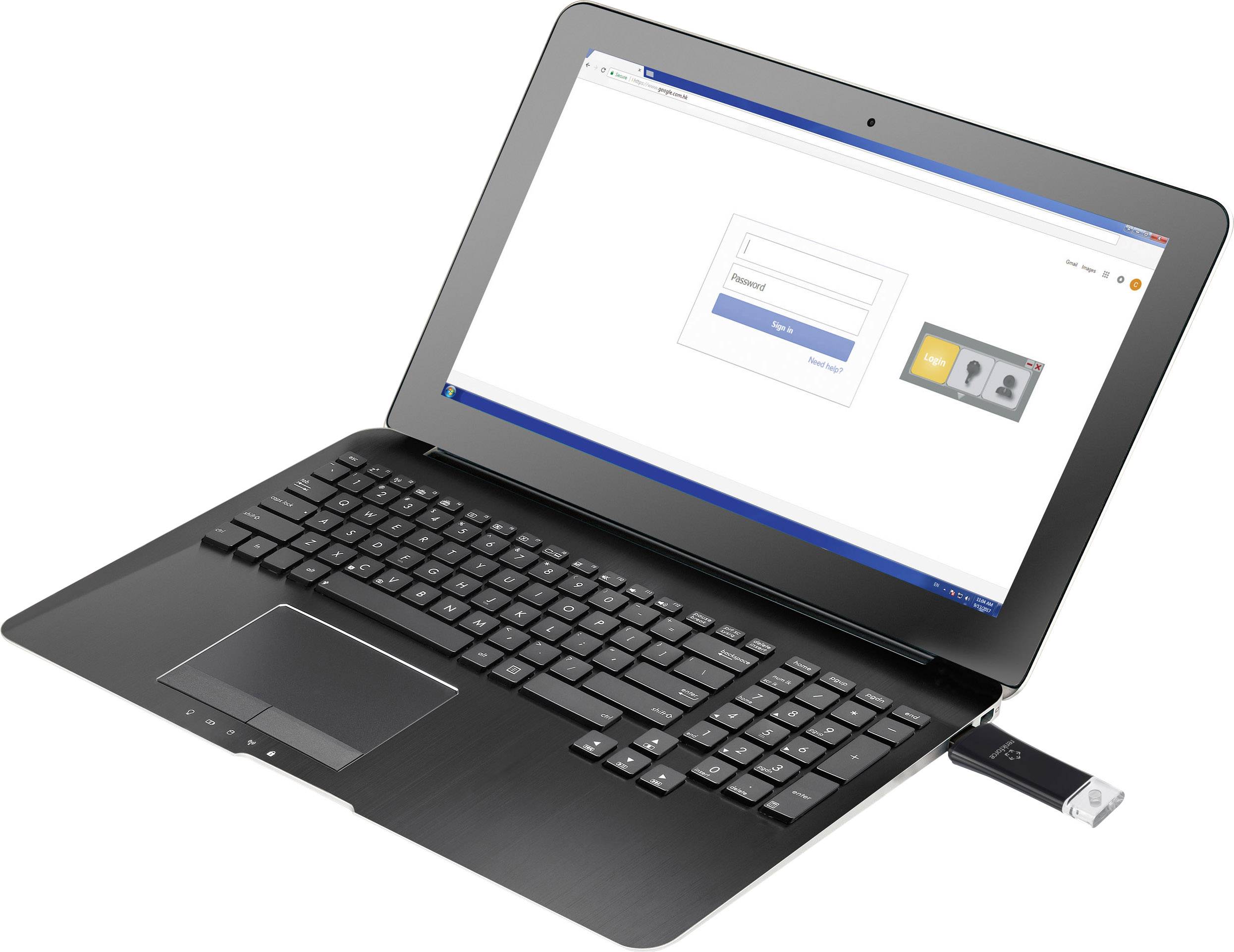 Notebook s připojeným USB flash diskem zobrazuje přihlašovací okno pro zadání 'uživatelského jména' a 'hesla' na obrazovce.