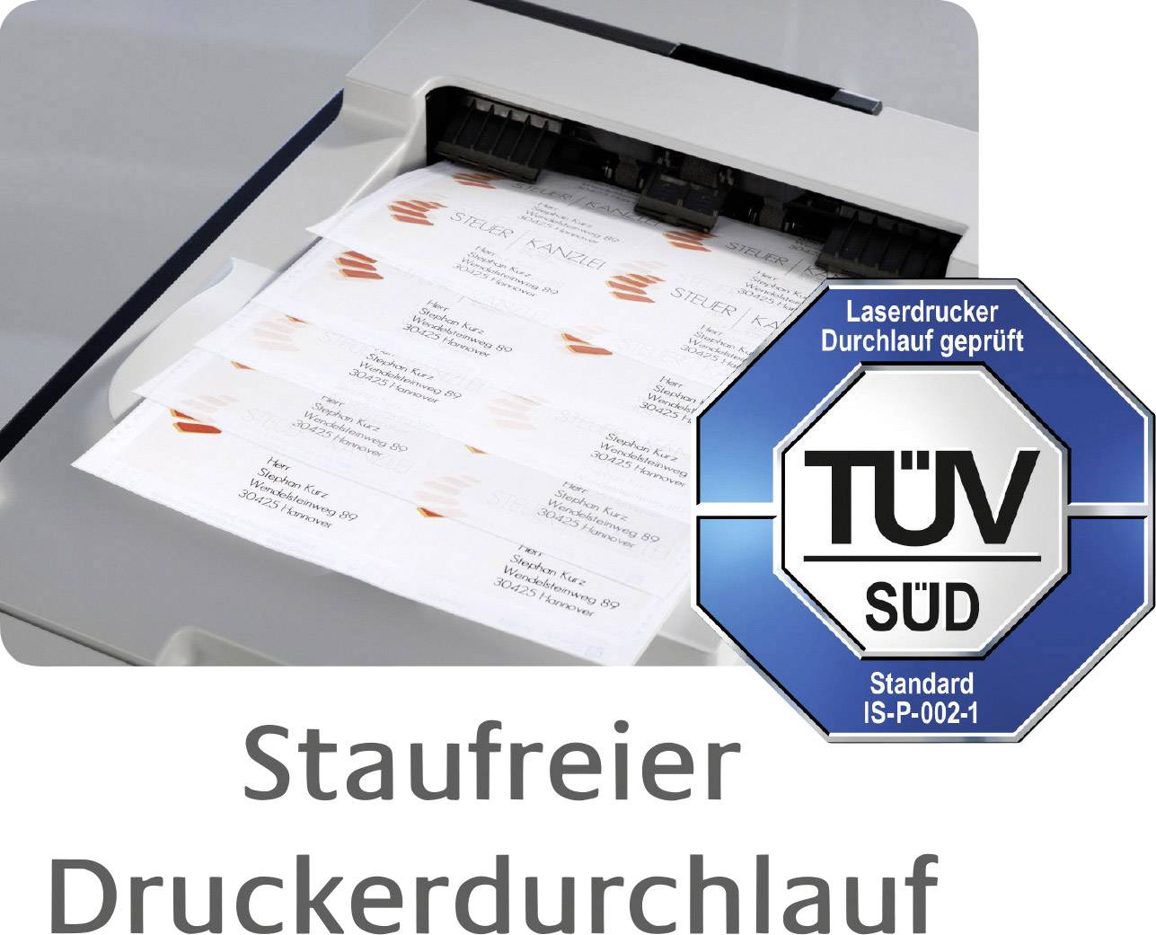 Tiskárna s průchodem bez ucpávání. Vpravo zkušební značka TÜV SÜD pro 'Průchod laserové tiskárny ověřen', standard IS-P-002-1.