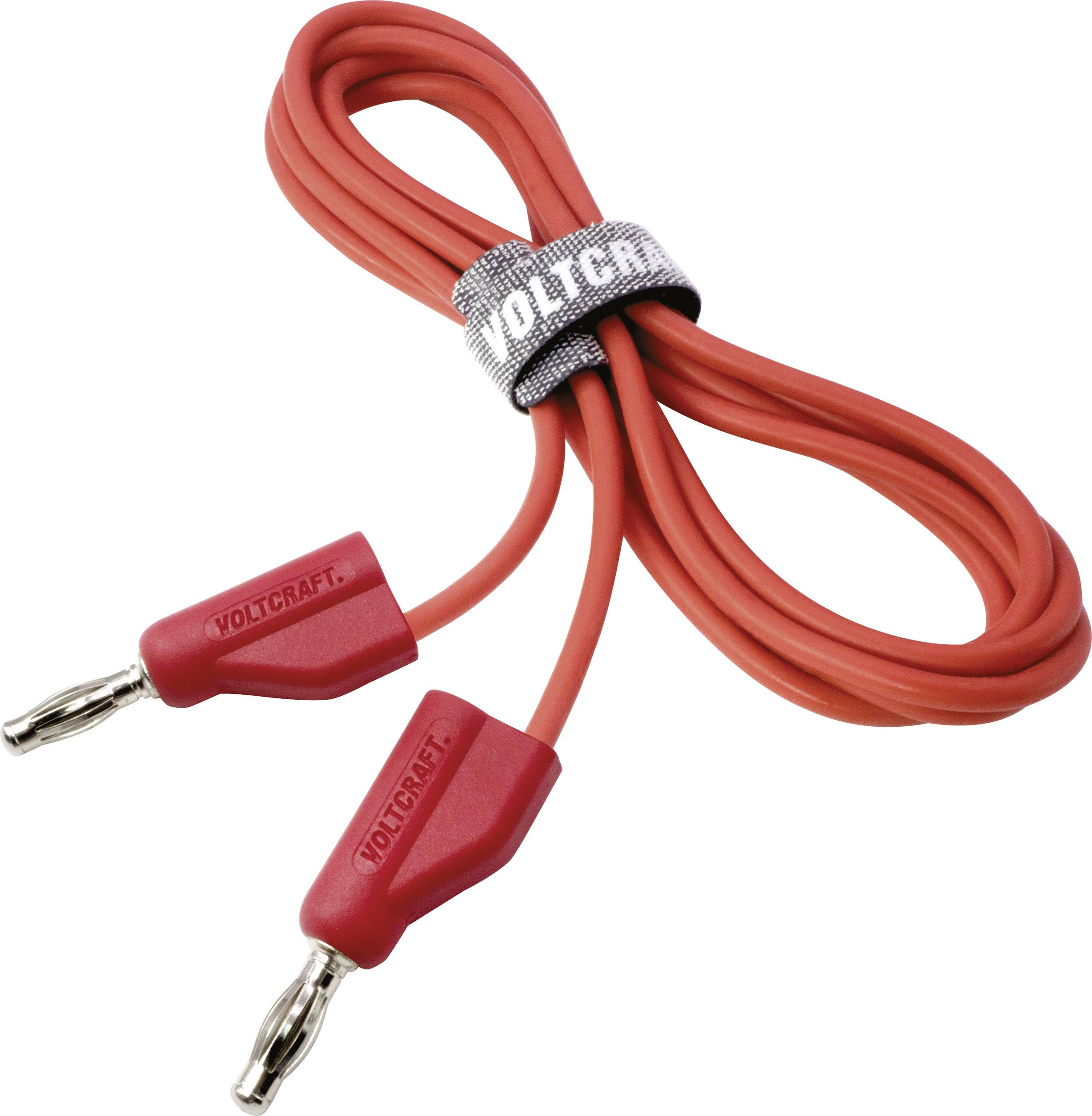 Červený měřicí kabel se dvěma izolovanými krokosvorkami a páskou 'Voltcraft' pro zajištění.