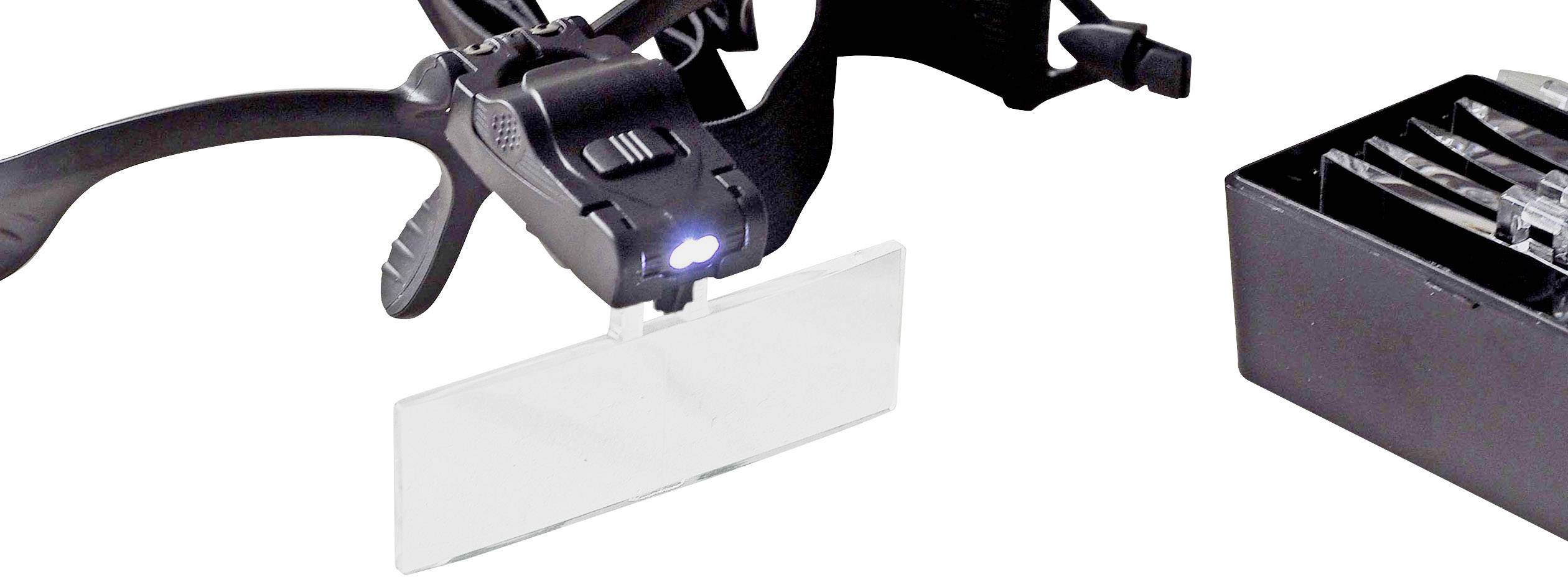 Lupa s LED osvětlením na průhledné čočce, vedle pouzdro s různými nástavnými čočkami.