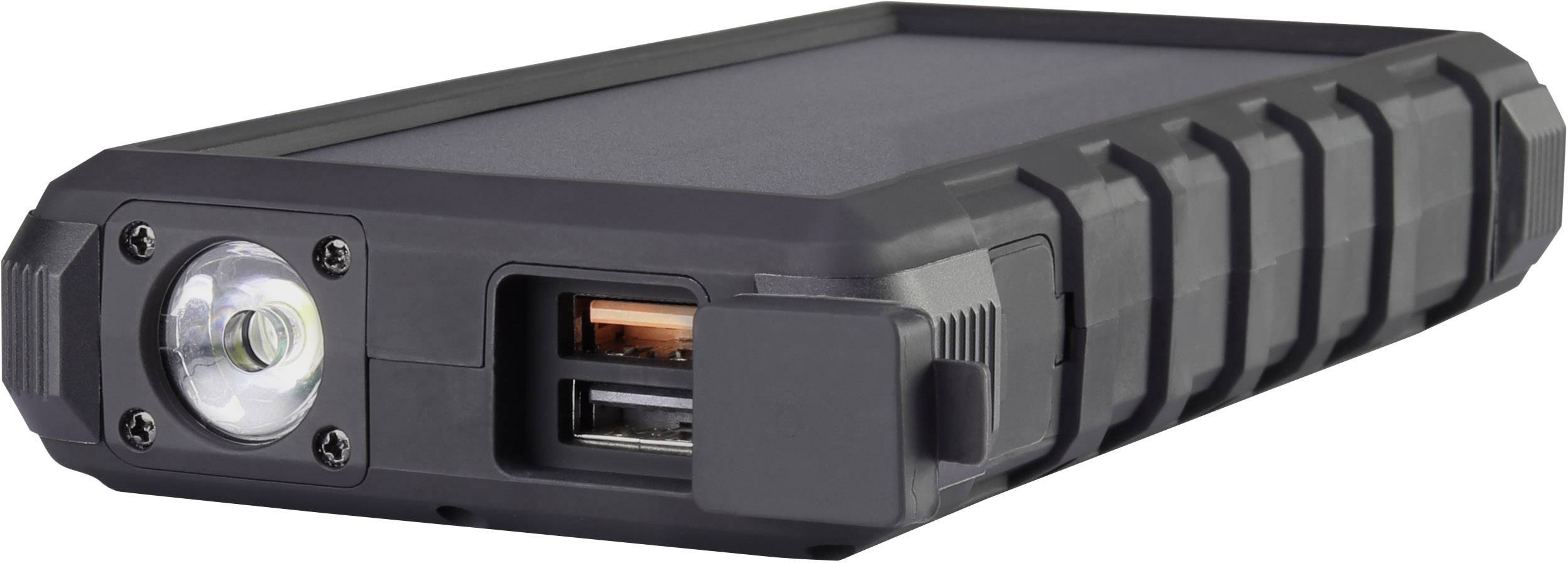 Černá powerbanka s robustním designem, LED světlem a dvěma USB porty, vhodná pro venkovní aktivity.