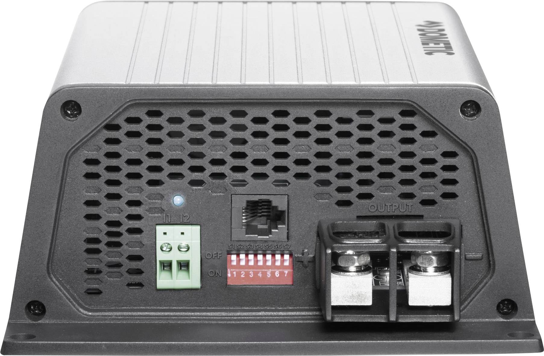 Šedý, obdélníkový elektronický konvertor s několika porty: zelený zástrčkový konektor, ethernetový port a dva velké šroubové svorky.