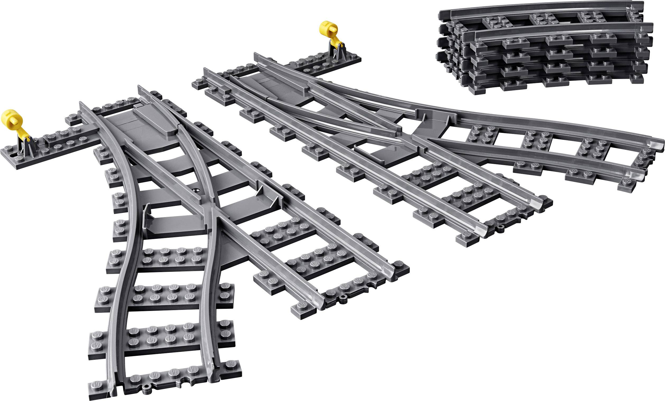 Sada LEGO kolejnic s výhybkami a přímými úseky pro rozšíření modelových kolejišť. Obsahuje šedé koleje s žlutými detaily.