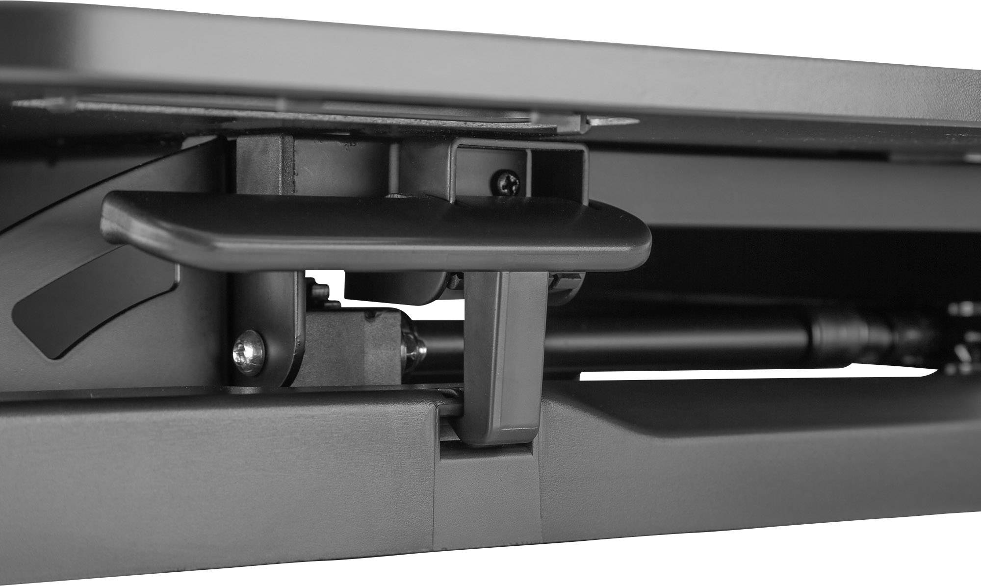 Mechanismus výškově nastavitelného stolu s pákou a hydraulickou tyčí, který umožňuje úpravu výšky stolu.