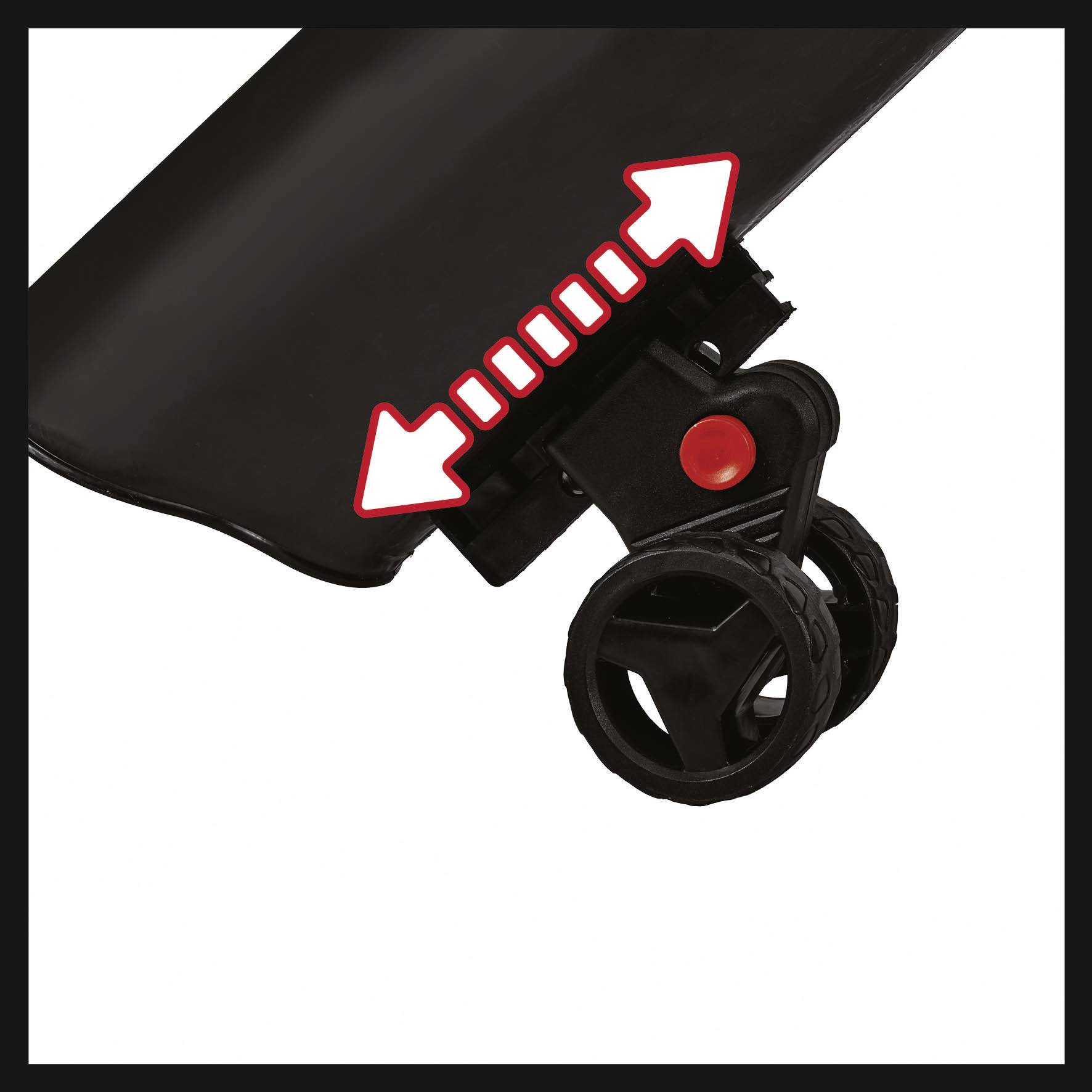 Detailní záběr černého kola dětského kočárku s červenými šipkami vlevo a vpravo, které poukazují na pohyblivou součástku.