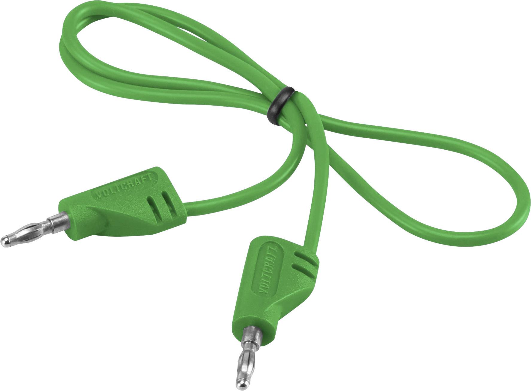 Zelený kabel se dvěma zástrčkami, použitelný pro elektrické připojení nebo elektronická zařízení.