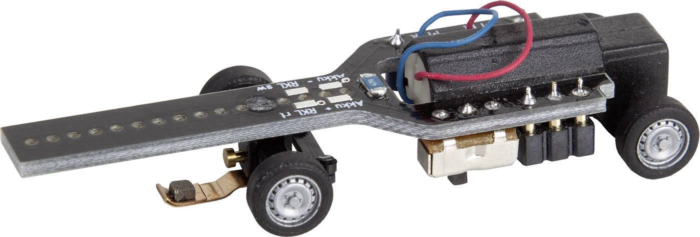 Malý černý elektronický senzor nebo spínač s kolečky, dráty a kovovými součástkami, pravděpodobně určený pro modelářství nebo technické experimenty.