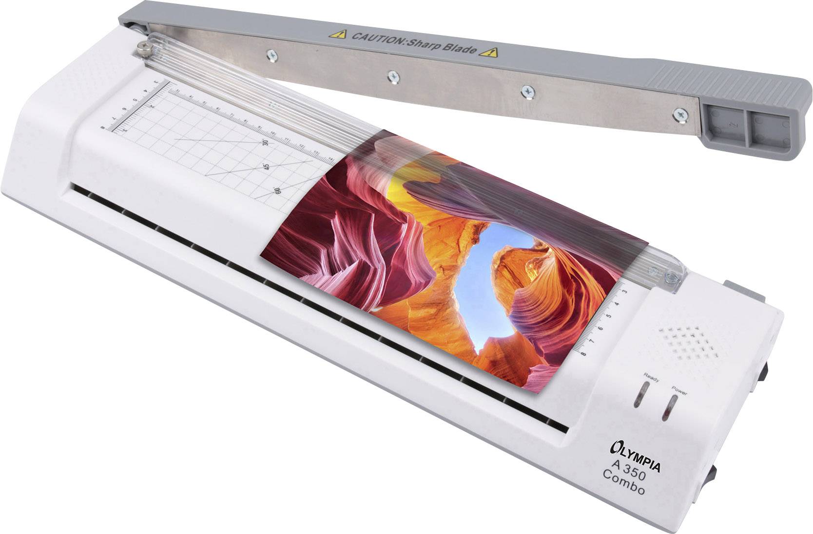 Laminátor a řezačka papíru Olympia A350 Combo. Laminovaná fotografie barevného kaňonu v zařízení. Výstražná poznámka o ostré čepeli.