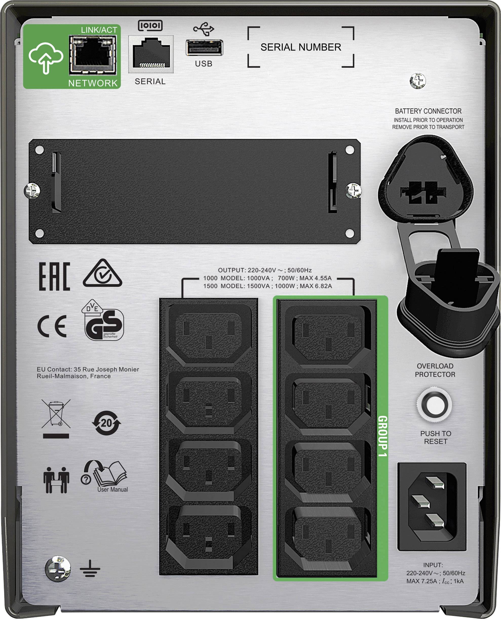 Zadní strana elektronického zařízení s několika zásuvkami a přepěťovou ochranou. Viditelné štítky a připojení.