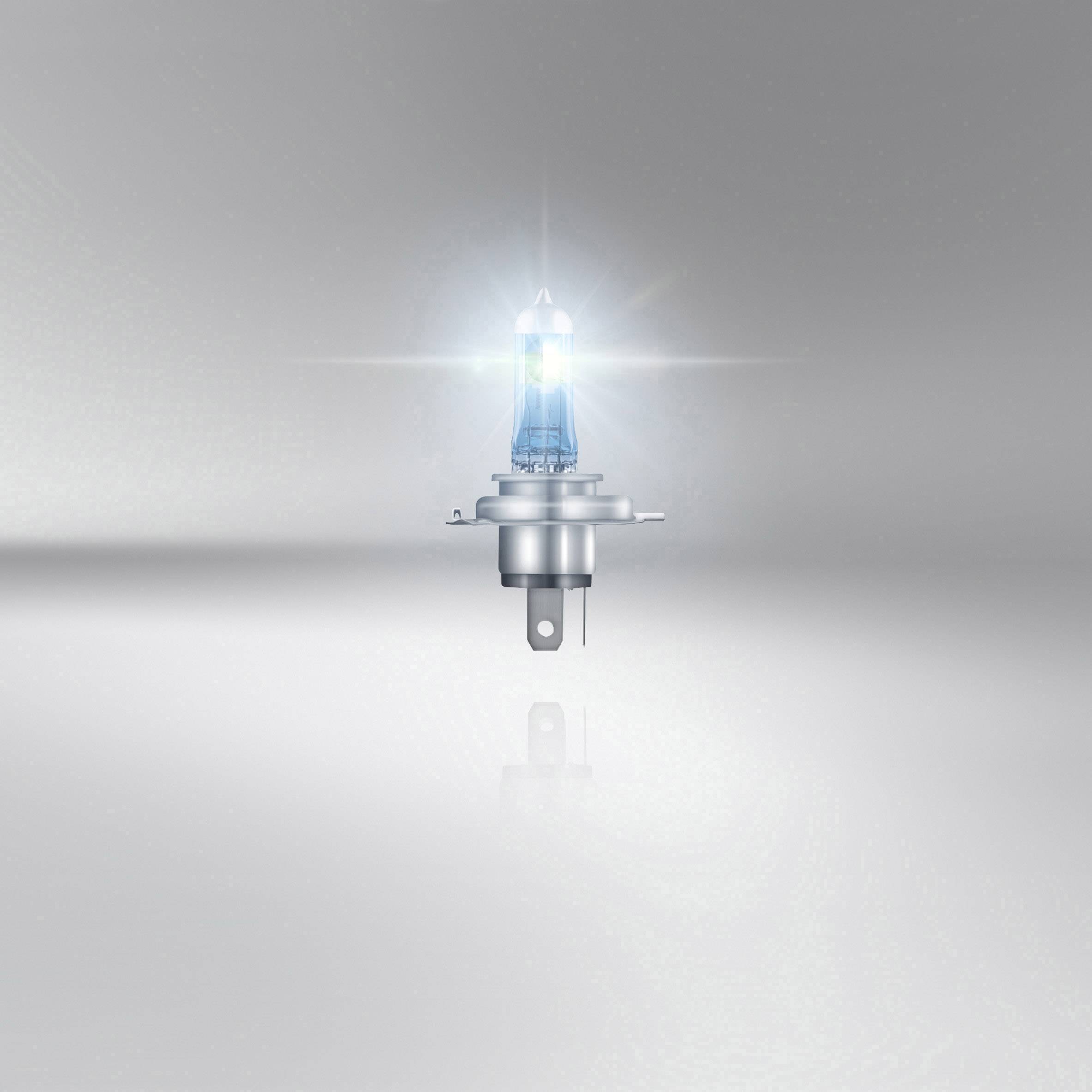 Jedna halogenová lampa svítí na neutrálním pozadí.