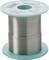 Pájecí lanko na cívce se zelenými konci, viditelné stříbřité drátěné vinutí. Název značky a specifikace jsou viditelné nahoře.