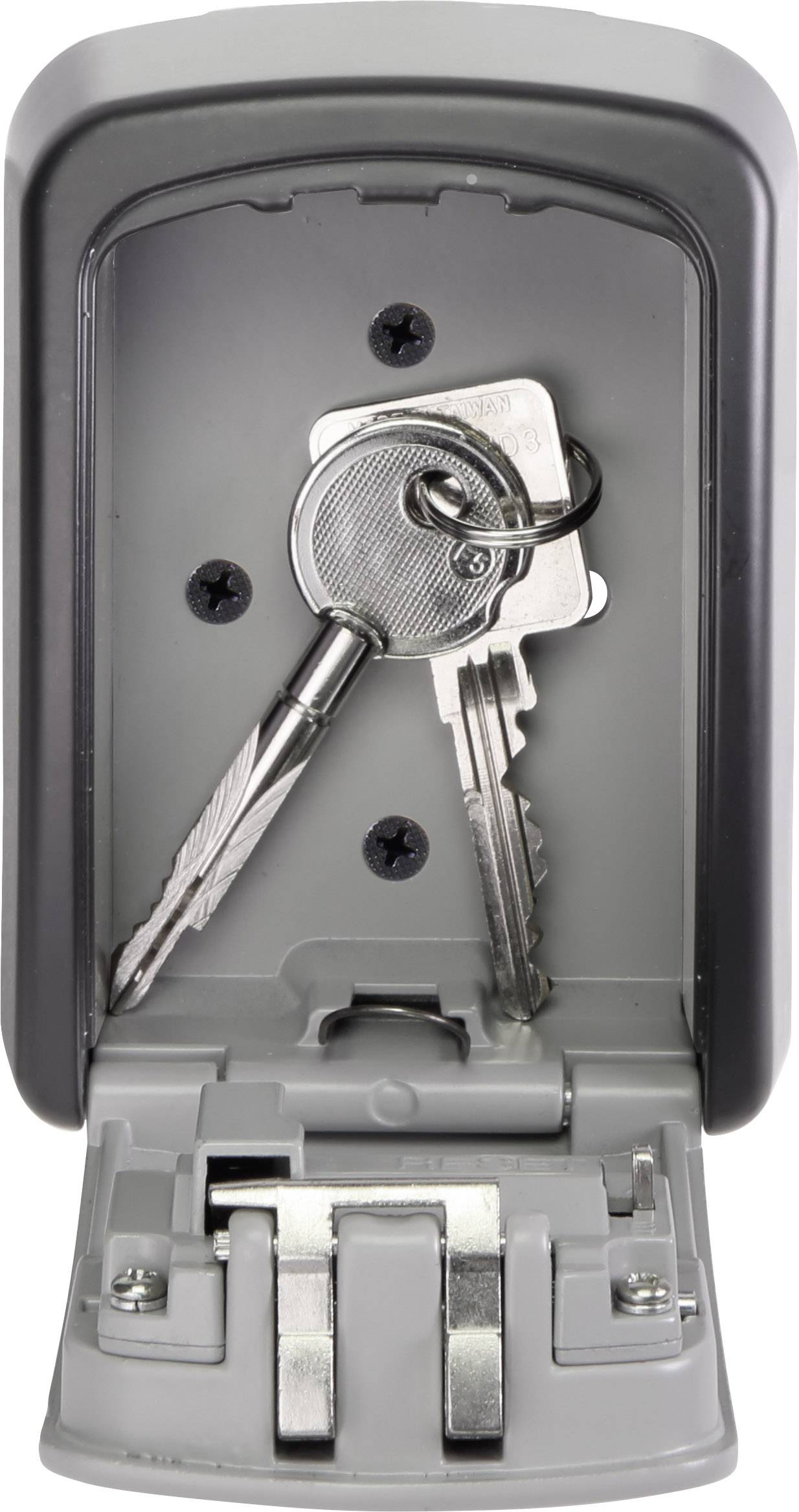 Otevřená schránka na klíče s dvěma klíči uvnitř, připevněná na stěně.