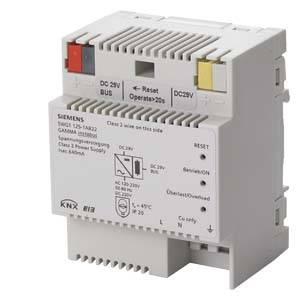 Spínaný napájecí zdroj od Siemensu pro systémy KNX s horními konektory, indikačními LED a popisy pro napájení.