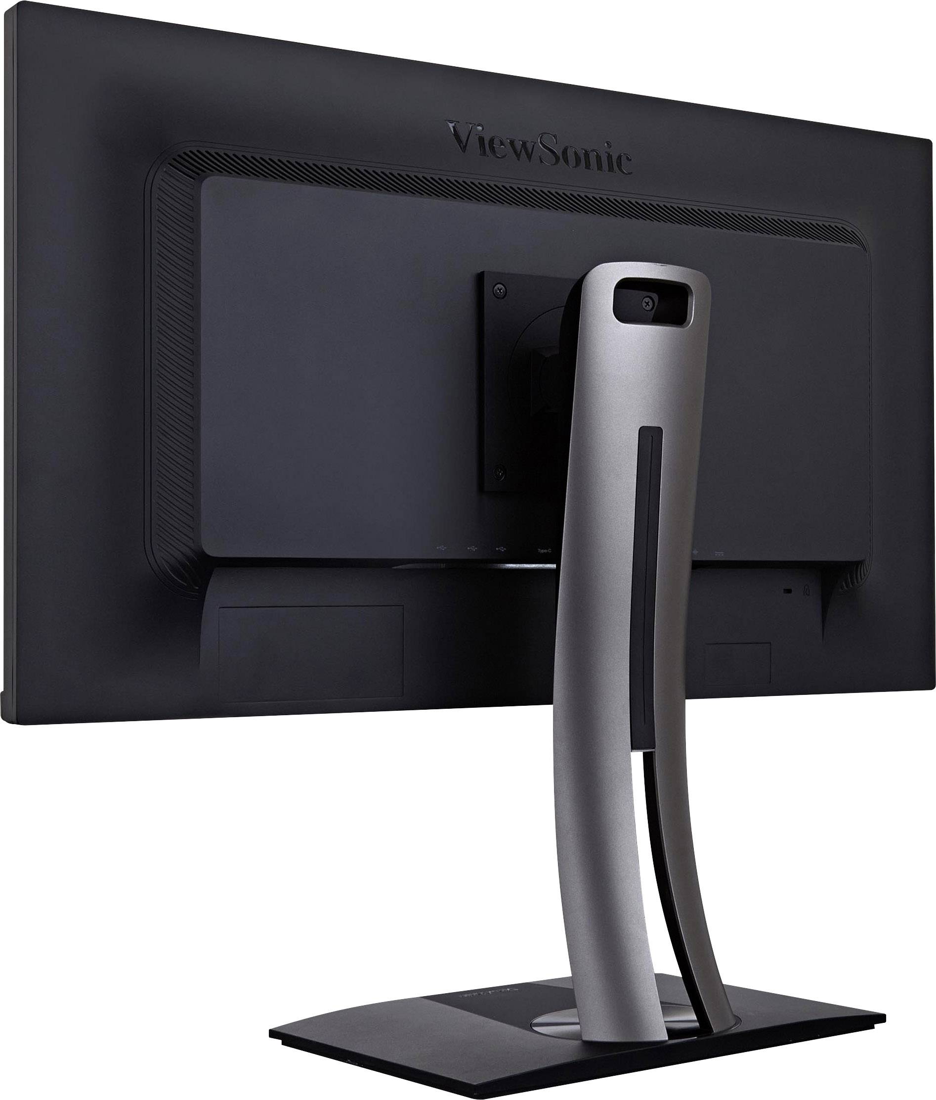 Pohled zezadu na černý monitor s prohnutým stříbrným stojanem umístěný na stole.