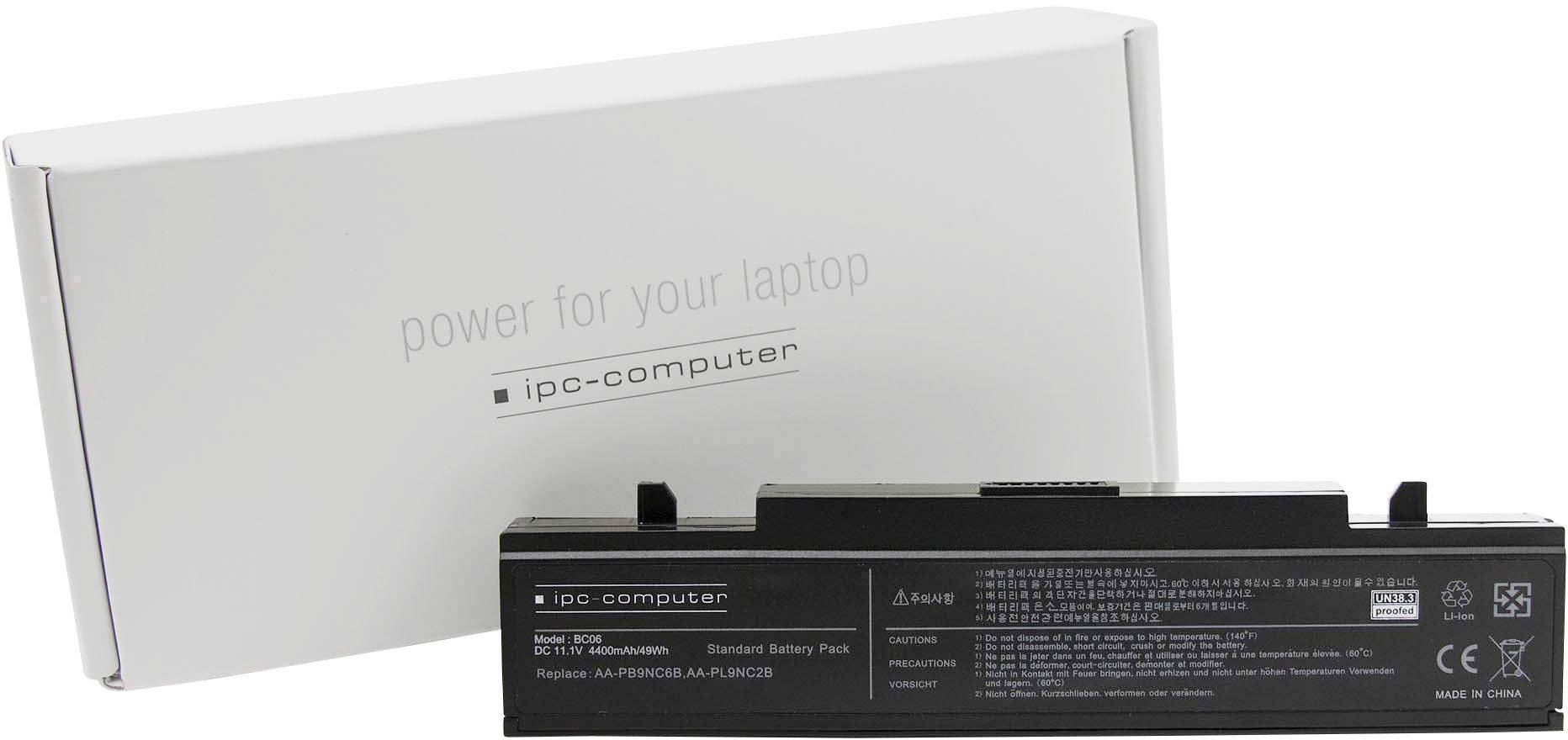 Notebook baterie před obalem s textem 'power for your laptop'. Sporé popisky naznačují údaje o modelu a kapacitě.