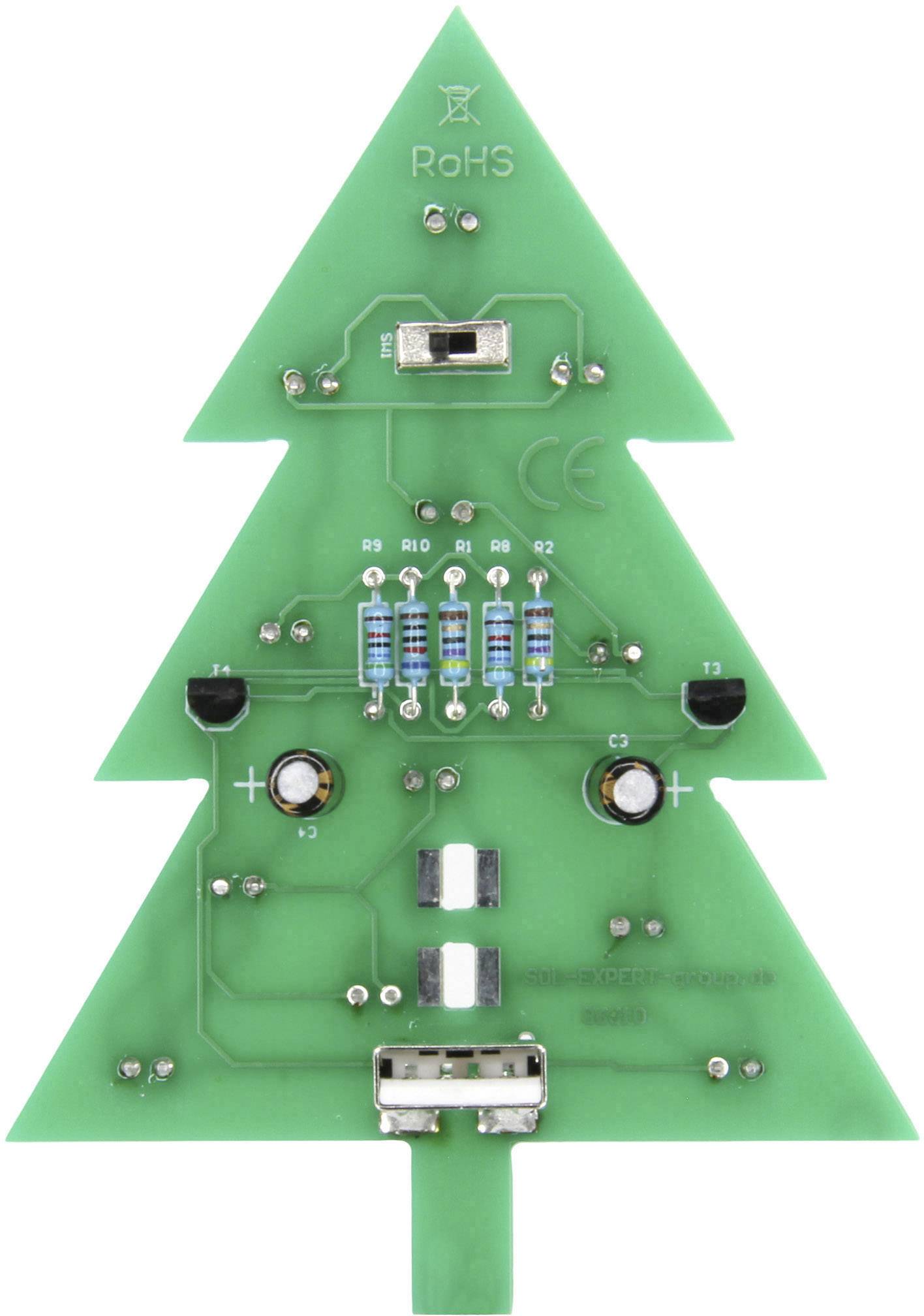 Zelená deska plošných spojů ve tvaru vánočního stromku s elektronickými komponenty, jako jsou rezistory a konektory.