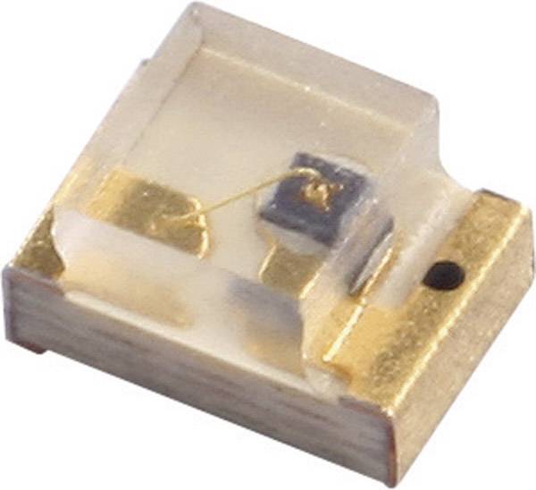 Elektronická součástka v detailním záběru, obdélníkového tvaru s miniaturními zlatými kontakty, pravděpodobně LED dioda nebo senzor.