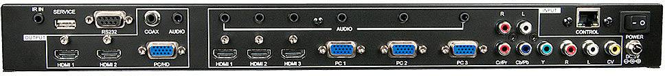 Zadní strana elektronického zařízení s různými konektory, včetně HDMI, VGA, Ethernetu a audia.