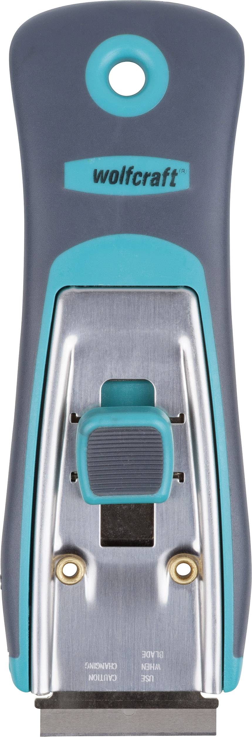 Ruční nářadí s ergonomickou rukojetí v modro-šedé barvě, viditelný název značky 'wolfcraft'. Vhodné pro broušení nebo hoblování.