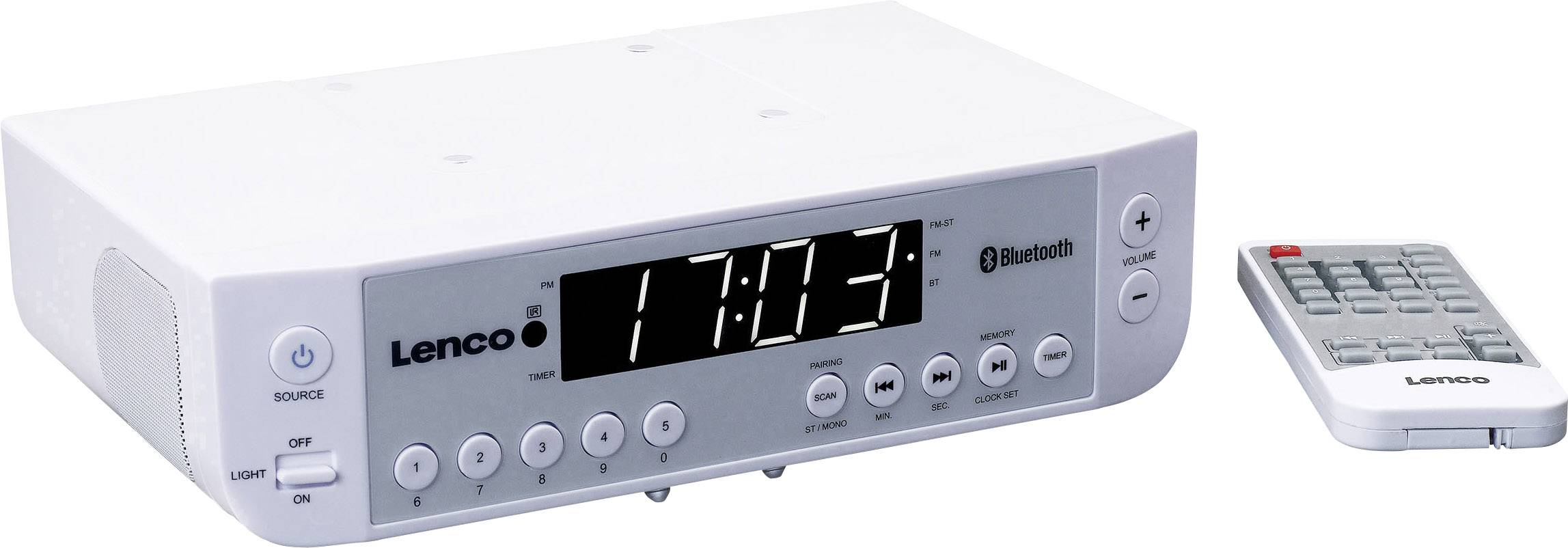 Bílý radiobudík s funkcí Bluetooth a digitálním displejem ukazuje '17:05'. Vedle něj leží dálkový ovladač.