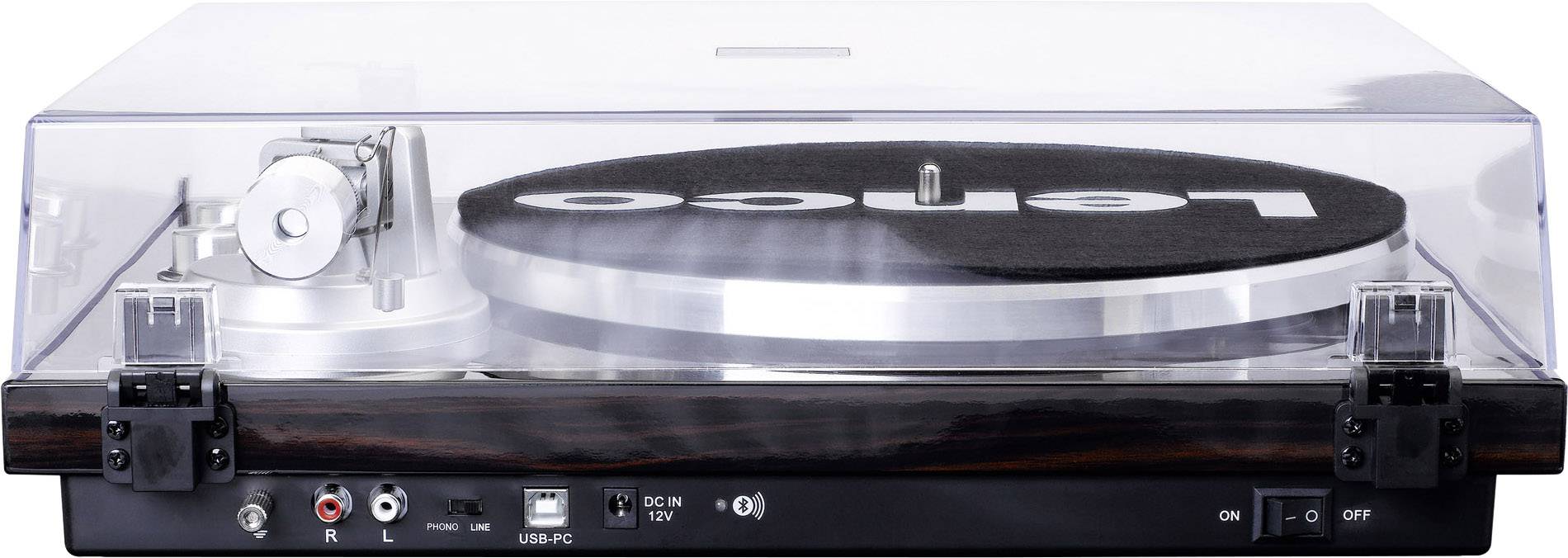 Gramofon s průhledným krytem, černým talířem a konektory na přední straně, vhodný pro vinylové desky.