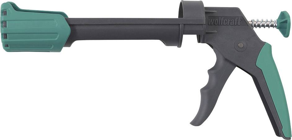 Černá a zelená pistole na kartuše od značky wolfcraft, vhodná pro nanášení lepidel nebo silikonů.