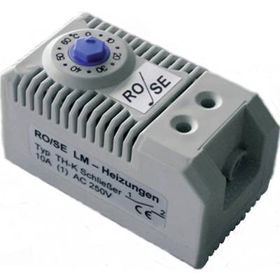 Termostat s otočným ovladačem, stupnice od 0 do 60 stupňů. Nápis 'RO/SE LM-topení, typ TH-K spínač, 10A AC250V'.