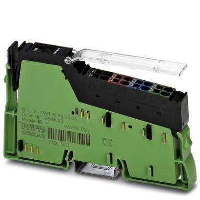 Zelený elektrický zásuvný modul s několika barevnými konektory a průhledným ochranným krytem, typický pro průmyslové aplikace.