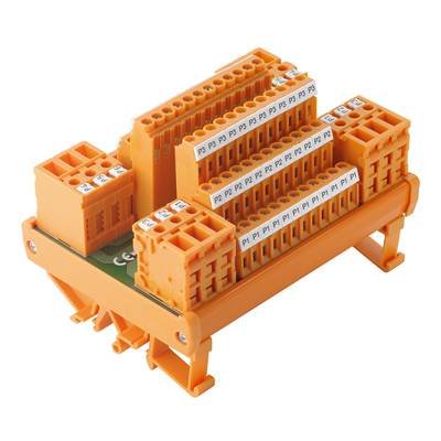 Oranžový elektrický modul konektoru s několika svorkami a štítky, vhodný pro průmyslové aplikace.