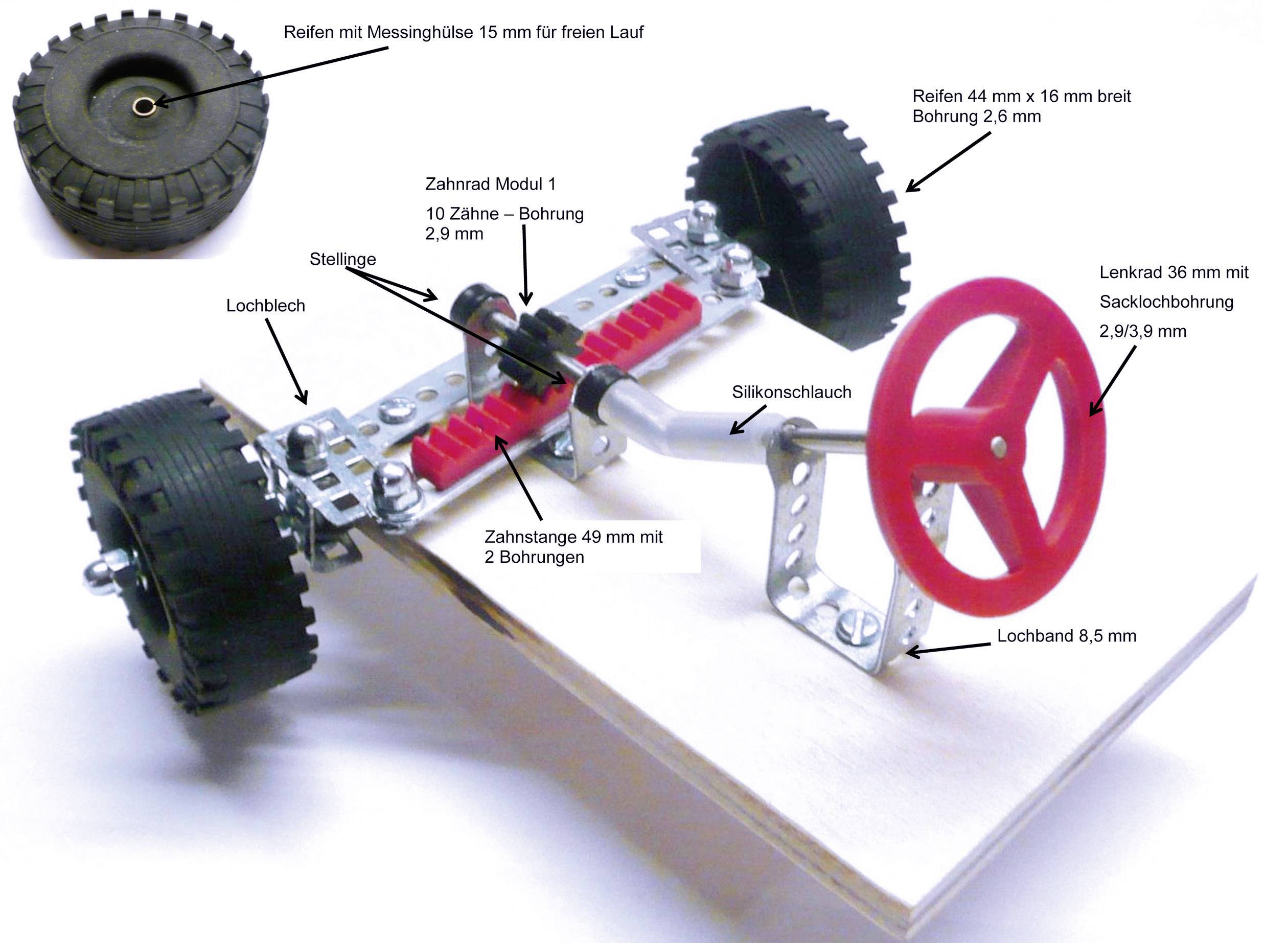 Podvozek s řízením: Štítek zobrazuje model podvozku autíčka s koly, mechanismem řízení, silikonem potaženou hadicí a ozubenou tyčí.