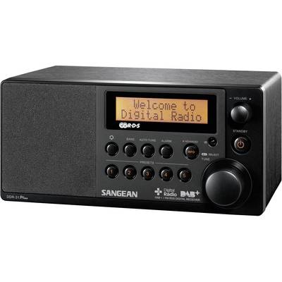 Černé digitální rádio s ovladačem hlasitosti, displej zobrazuje 'Vítejte v digitálním rádiu', různé ovládací tlačítka.