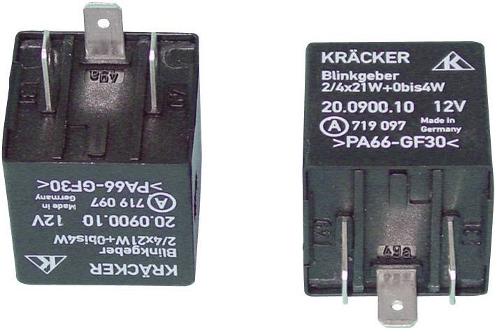 Dva černé, kvádrové elektronické komponenty s bílými potisky a kovovými kontakty. Čitelný nápis 'KRÄCKER Blinkgeber'.