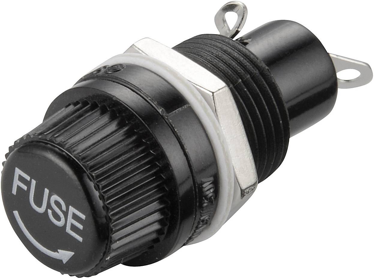 Kulatá černá zásuvka pojistkového držáku s nápisem „FUSE" na víčku, která disponuje dvěma kovovými kontakty.