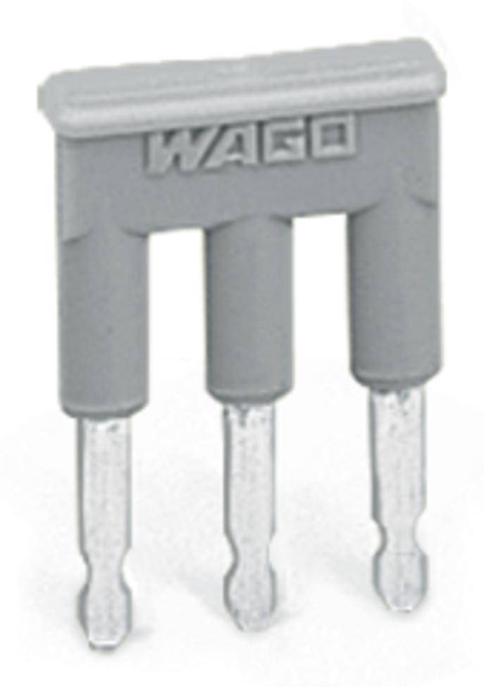 Šedý plastový můstek se třemi kovovými kolíky s nápisem 'WAGO' pro propojování elektrických vodičů v zásuvných svorkách.