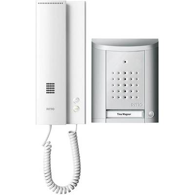 Telefon s integrovaným reproduktorem a mikrofonem. Vpravo je videotelefon se jmenovkou 'Tina Wagner'.
