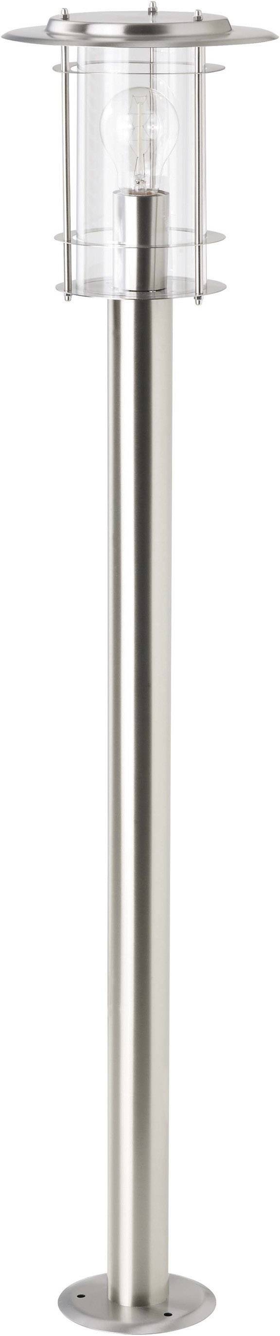 Stojací lampa z nerezové oceli s průhledným stínidlem.