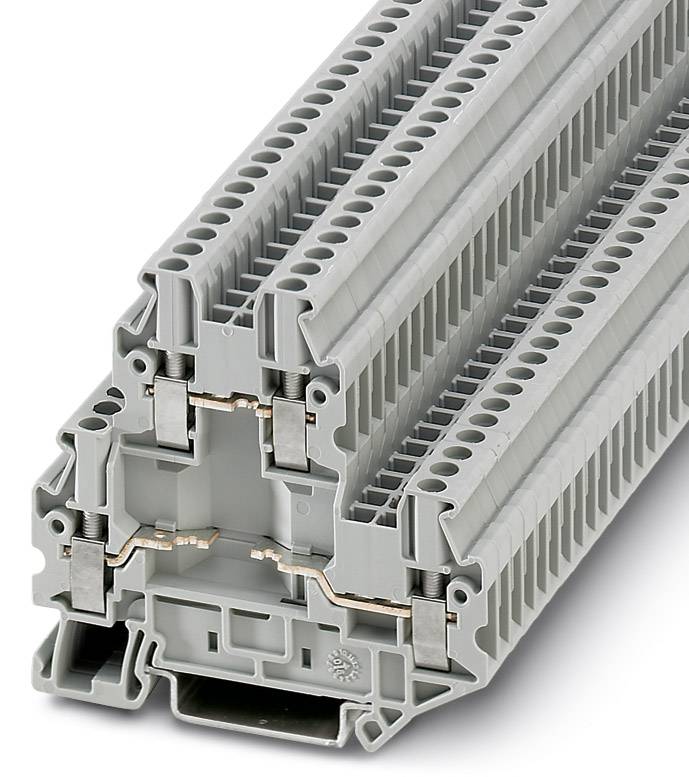 Vícepatrová řadová svorkovnice s několika šedými sloty. Slouží k bezpečnému propojení kabelů v elektrických rozváděčích.