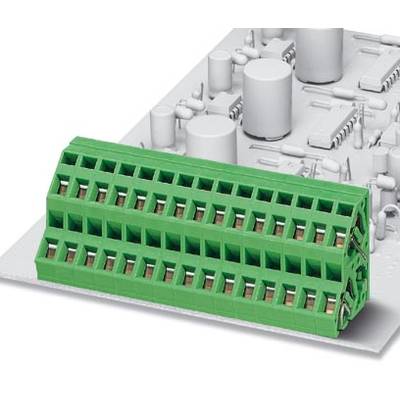 Zelená svorka na bílé desce plošných spojů s několika elektronickými komponenty.