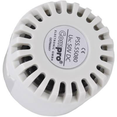 Bílý elektronický signalizátor od společnosti ComPro, model PSS-5560, určený pro napětí 5 až 50 V DC, s větracími otvory.