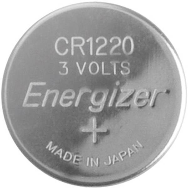 Kulatá stříbrná knoflíková baterie s nápisem 'CR1220 3 Volts Energizer, Made in Japan'.