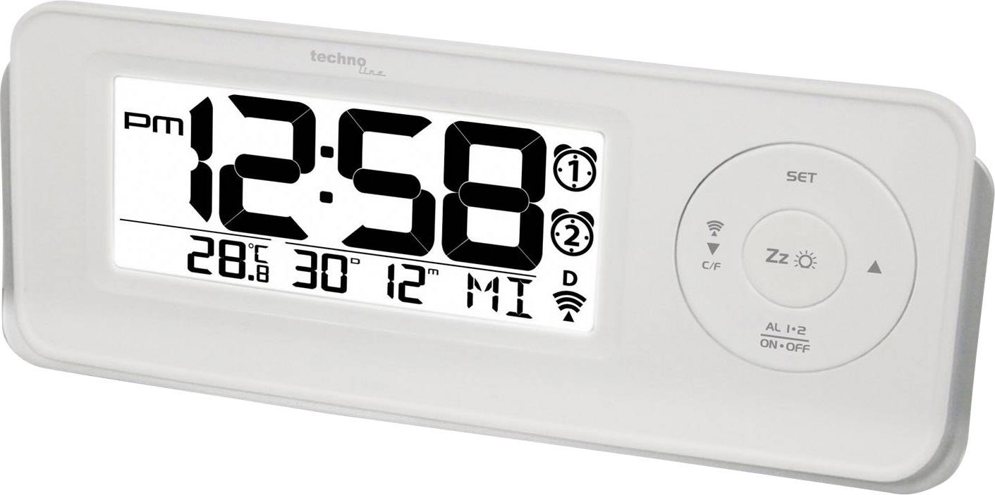 Digitální hodiny s velkým displejem zobrazují '12:58 PM'. Údaje z prostředí: Teplota 28,6°C, 30% vlhkost vzduchu. Ovládací tlačítka vpravo.