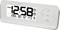 Digitální hodiny s velkým displejem zobrazují '12:58 PM'. Údaje z prostředí: Teplota 28,6°C, 30% vlhkost vzduchu. Ovládací tlačítka vpravo.