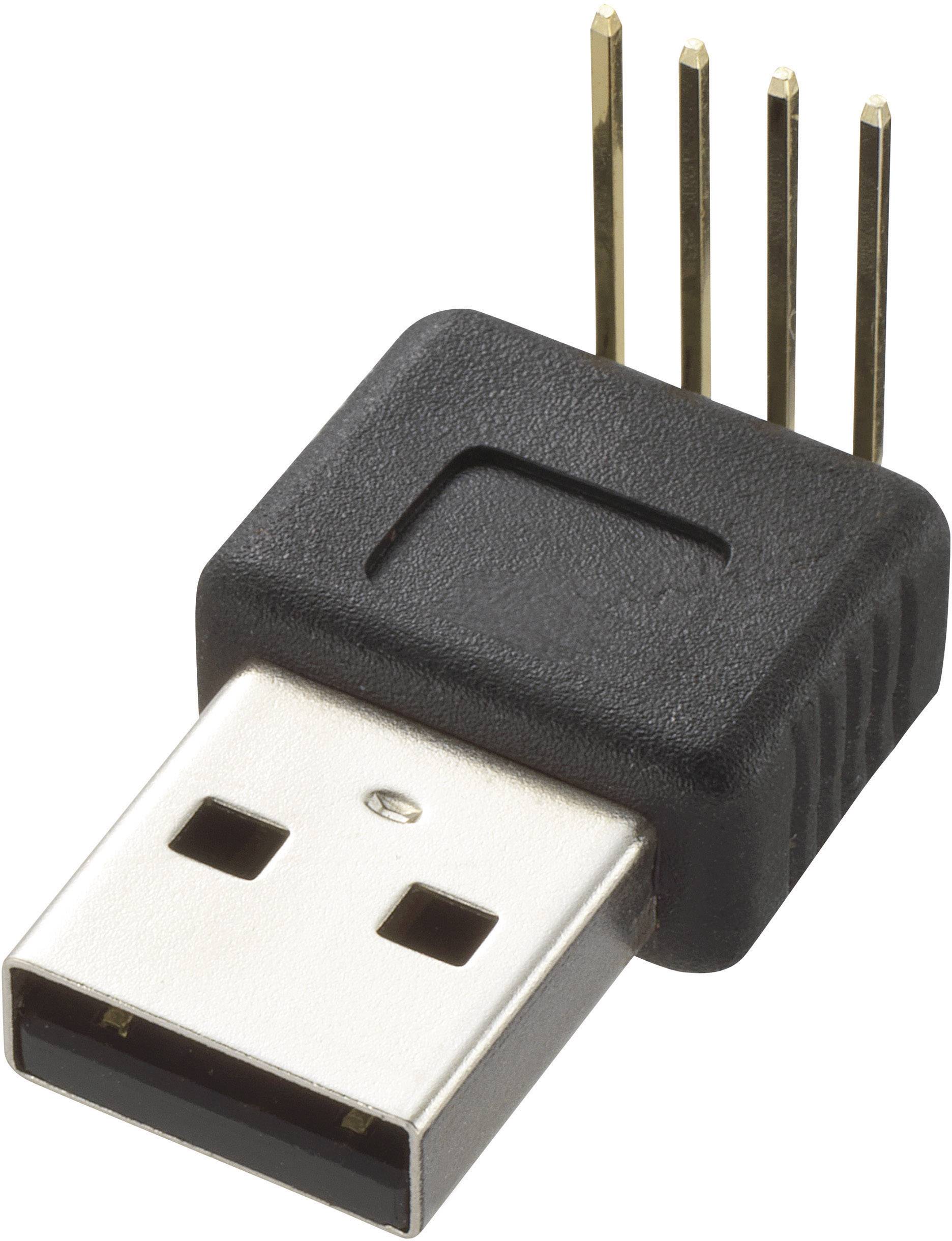USB adaptér s černým pouzdrem a čtyřmi zlatými kolíky vyčnívajícími z horní strany, určený pro propojení zařízení.