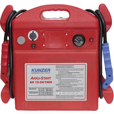 Červené přenosné startovací zařízení s rukojetí, indikátorem stavu nabití a dvěma kabely pro připojení k autobaterii. Hlavní text: 'Akku-Start AS 12-24/1600'.