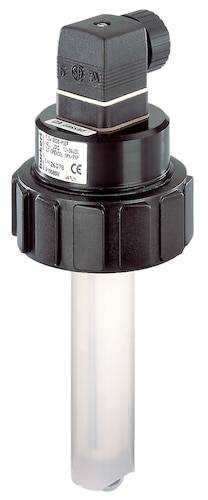 En sort elektrisk sensor-stik på en transparent cylinder, sandsynligvis en industriel flowsensor eller -måler.