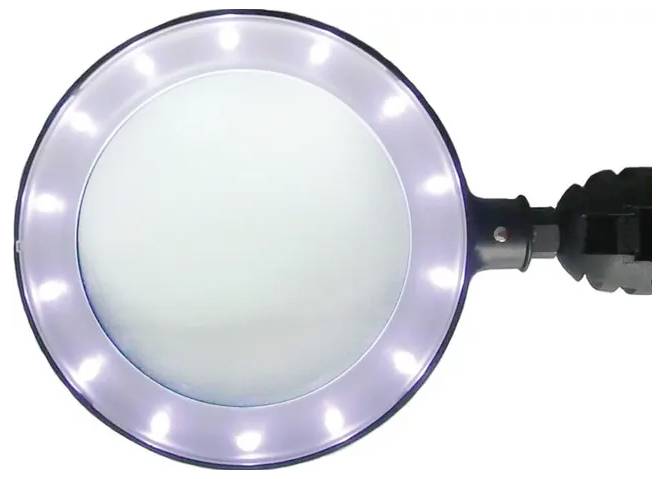 Cirkulært oplyst forstørrelsespeglas med LED-lys rundt om kanten, brugt til nærgranskning eller læsning af småt tryk.
