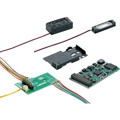 Et sæt elektroniske komponenter, herunder et grønt printplade, højttalerdele og forbindelseskabler.