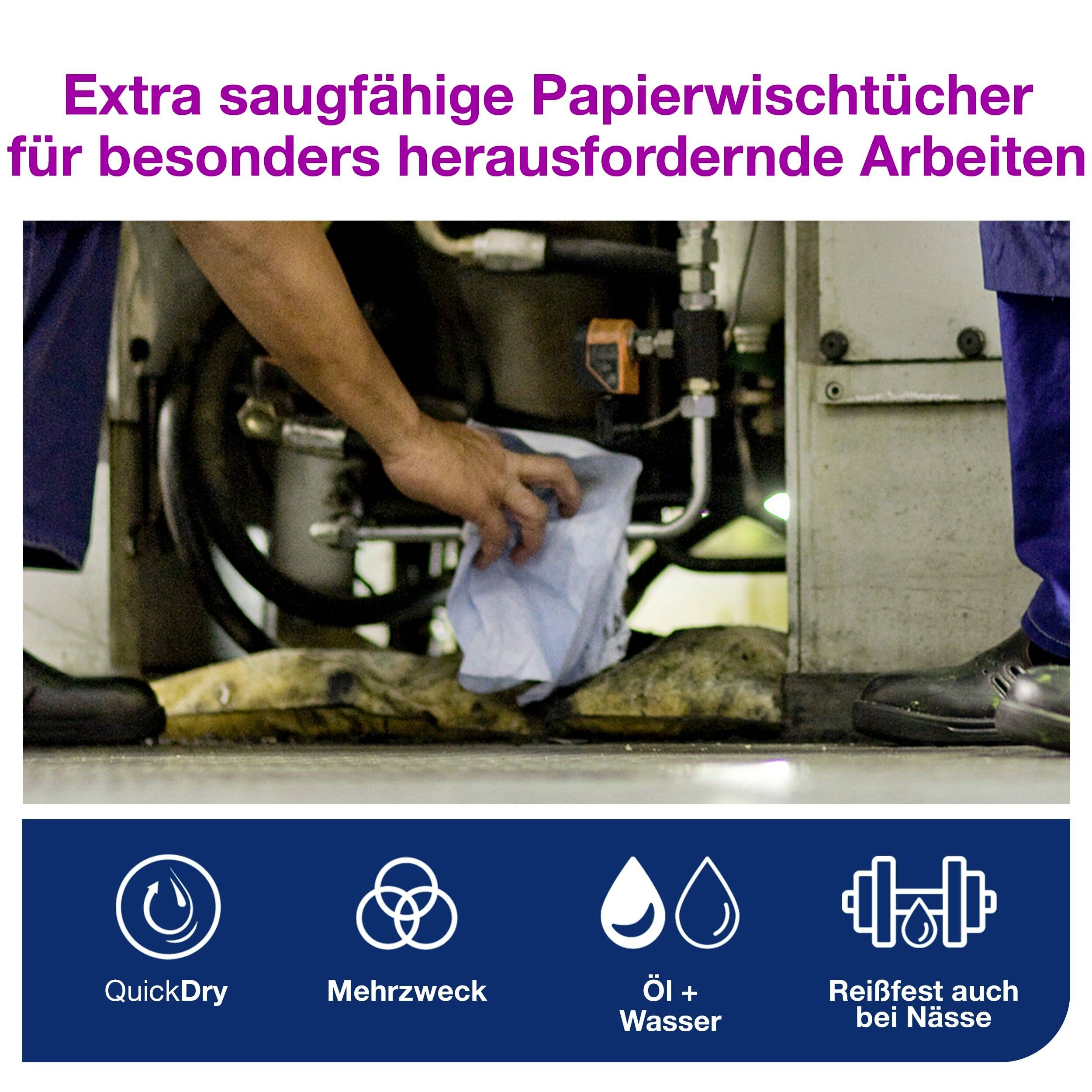 En person tørrer under en maskine med et papirhåndklæde. Papirhåndklædet er ekstra absorberende og alsidigt anvendeligt, og det er stærkt, selv når det er vådt.