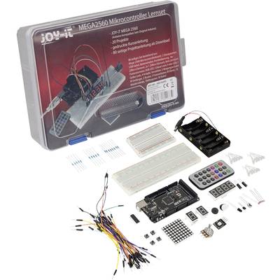 Mikrocontroller-sæt med forskellige elektroniske komponenter, kabler og printplader til projekter og programmering.
